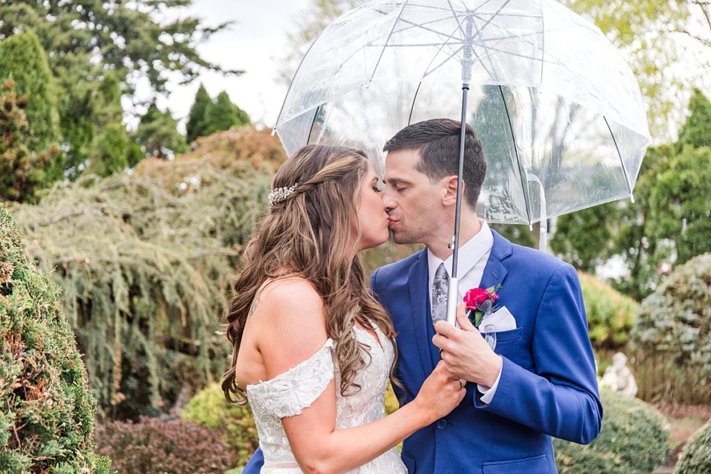 Bride and Groom with Umbrella Photos